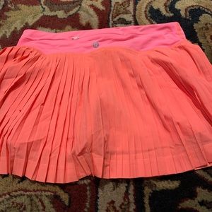 Lululemon pleated skirt. Coral and pink. Size 4
